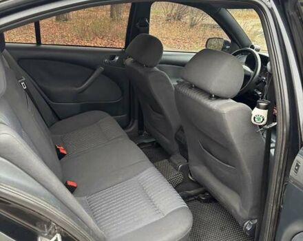 Черный Шкода Октавия, объемом двигателя 1.8 л и пробегом 297 тыс. км за 6500 $, фото 11 на Automoto.ua