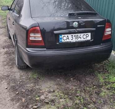 Черный Шкода Октавия, объемом двигателя 1.6 л и пробегом 292 тыс. км за 4500 $, фото 2 на Automoto.ua