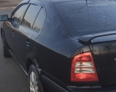 Черный Шкода Октавия, объемом двигателя 1.8 л и пробегом 270 тыс. км за 5400 $, фото 6 на Automoto.ua