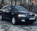 Черный Шкода Октавия, объемом двигателя 1.6 л и пробегом 273 тыс. км за 5400 $, фото 1 на Automoto.ua