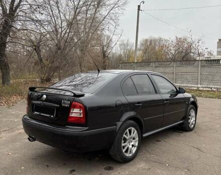 Черный Шкода Октавия, объемом двигателя 1.8 л и пробегом 297 тыс. км за 6500 $, фото 2 на Automoto.ua