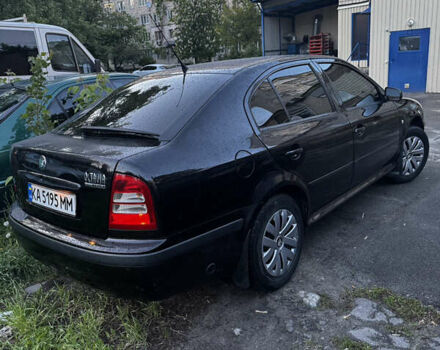 Черный Шкода Октавия, объемом двигателя 1.6 л и пробегом 250 тыс. км за 5200 $, фото 6 на Automoto.ua