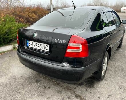 Черный Шкода Октавия, объемом двигателя 2 л и пробегом 240 тыс. км за 5400 $, фото 2 на Automoto.ua