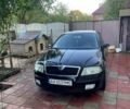 Черный Шкода Октавия, объемом двигателя 1.6 л и пробегом 240 тыс. км за 4900 $, фото 1 на Automoto.ua