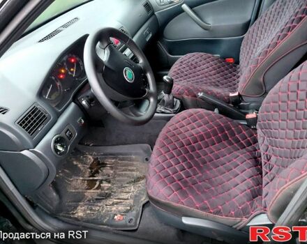 Черный Шкода Октавия, объемом двигателя 1.6 л и пробегом 187 тыс. км за 5700 $, фото 4 на Automoto.ua