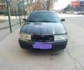 Черный Шкода Октавия, объемом двигателя 1.6 л и пробегом 180 тыс. км за 6400 $, фото 1 на Automoto.ua