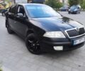 Черный Шкода Октавия, объемом двигателя 2 л и пробегом 306 тыс. км за 5700 $, фото 1 на Automoto.ua