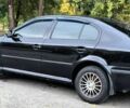 Черный Шкода Октавия, объемом двигателя 1.6 л и пробегом 310 тыс. км за 5350 $, фото 1 на Automoto.ua