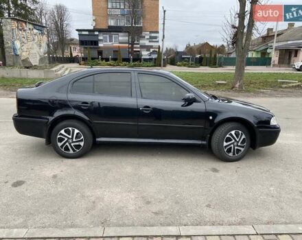Черный Шкода Октавия, объемом двигателя 1.6 л и пробегом 292 тыс. км за 5250 $, фото 2 на Automoto.ua