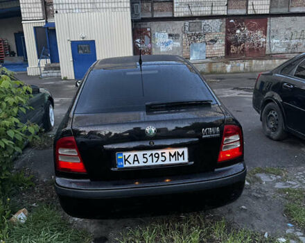 Черный Шкода Октавия, объемом двигателя 1.6 л и пробегом 250 тыс. км за 5200 $, фото 5 на Automoto.ua