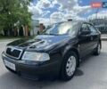 Черный Шкода Октавия, объемом двигателя 1.6 л и пробегом 199 тыс. км за 4800 $, фото 1 на Automoto.ua