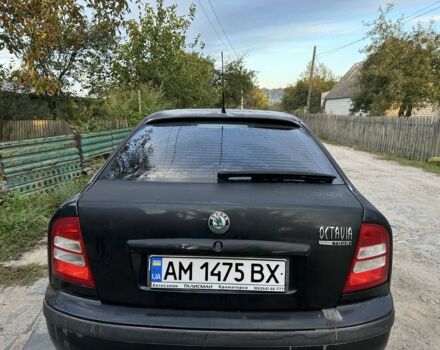 Черный Шкода Октавия, объемом двигателя 1.6 л и пробегом 210 тыс. км за 5200 $, фото 3 на Automoto.ua