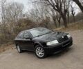 Черный Шкода Октавия, объемом двигателя 1.8 л и пробегом 297 тыс. км за 6500 $, фото 1 на Automoto.ua