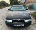 Черный Шкода Октавия, объемом двигателя 1.6 л и пробегом 210 тыс. км за 5200 $, фото 1 на Automoto.ua