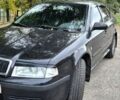 Черный Шкода Октавия, объемом двигателя 1.6 л и пробегом 310 тыс. км за 5350 $, фото 2 на Automoto.ua