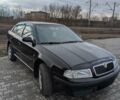 Черный Шкода Октавия, объемом двигателя 1.6 л и пробегом 370 тыс. км за 5300 $, фото 4 на Automoto.ua
