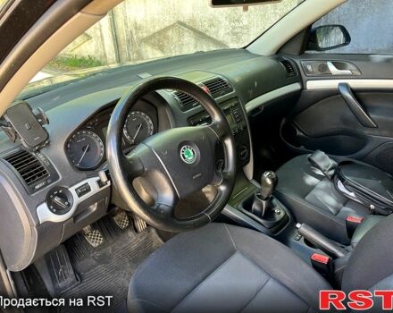 Черный Шкода Октавия, объемом двигателя 1.6 л и пробегом 255 тыс. км за 4000 $, фото 2 на Automoto.ua