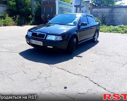 Чорний Шкода Октавія, об'ємом двигуна 1.8 л та пробігом 345 тис. км за 5700 $, фото 9 на Automoto.ua