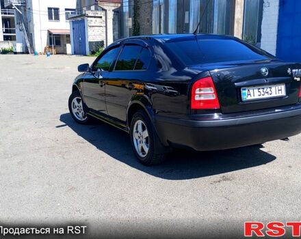 Чорний Шкода Октавія, об'ємом двигуна 1.8 л та пробігом 345 тис. км за 5700 $, фото 1 на Automoto.ua