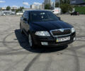Черный Шкода Октавия, объемом двигателя 2 л и пробегом 154 тыс. км за 7200 $, фото 1 на Automoto.ua