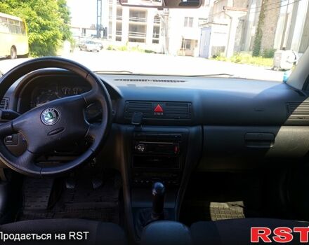 Чорний Шкода Октавія, об'ємом двигуна 1.8 л та пробігом 345 тис. км за 5700 $, фото 6 на Automoto.ua