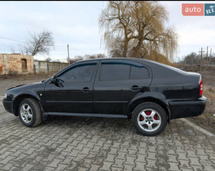 Черный Шкода Октавия, объемом двигателя 1.6 л и пробегом 370 тыс. км за 5300 $, фото 8 на Automoto.ua