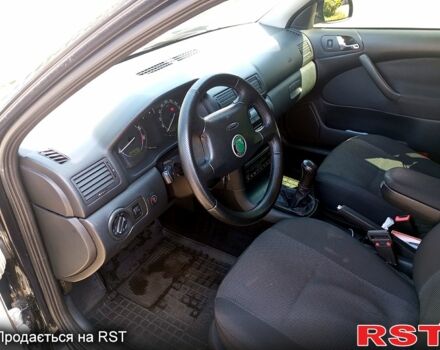 Чорний Шкода Октавія, об'ємом двигуна 1.8 л та пробігом 345 тис. км за 5700 $, фото 7 на Automoto.ua