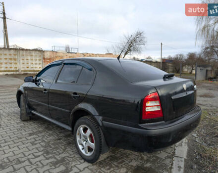 Черный Шкода Октавия, объемом двигателя 1.6 л и пробегом 370 тыс. км за 5300 $, фото 2 на Automoto.ua