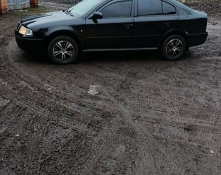 Черный Шкода Октавия, объемом двигателя 1.6 л и пробегом 175 тыс. км за 5750 $, фото 1 на Automoto.ua