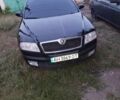 Черный Шкода Октавия, объемом двигателя 1.6 л и пробегом 210 тыс. км за 6300 $, фото 1 на Automoto.ua