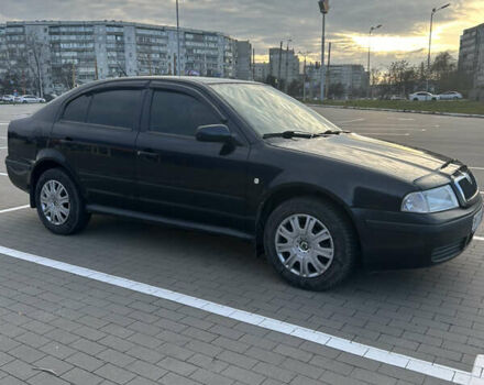 Черный Шкода Октавия, объемом двигателя 1.6 л и пробегом 263 тыс. км за 5600 $, фото 1 на Automoto.ua