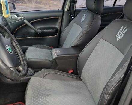 Черный Шкода Октавия, объемом двигателя 1.6 л и пробегом 370 тыс. км за 5300 $, фото 9 на Automoto.ua