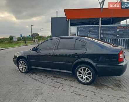Черный Шкода Октавия, объемом двигателя 1.6 л и пробегом 228 тыс. км за 4800 $, фото 7 на Automoto.ua
