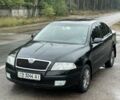 Черный Шкода Октавия, объемом двигателя 2 л и пробегом 430 тыс. км за 4450 $, фото 1 на Automoto.ua