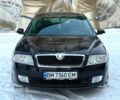 Черный Шкода Октавия, объемом двигателя 1.6 л и пробегом 208 тыс. км за 6500 $, фото 1 на Automoto.ua