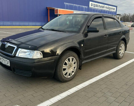 Черный Шкода Октавия, объемом двигателя 1.6 л и пробегом 263 тыс. км за 5600 $, фото 5 на Automoto.ua