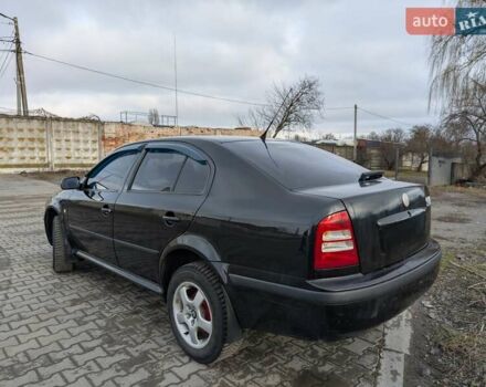 Черный Шкода Октавия, объемом двигателя 1.6 л и пробегом 370 тыс. км за 5300 $, фото 7 на Automoto.ua