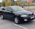 Черный Шкода Октавия, объемом двигателя 1.6 л и пробегом 210 тыс. км за 5600 $, фото 1 на Automoto.ua