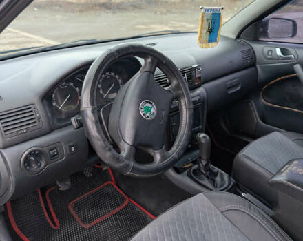 Черный Шкода Октавия, объемом двигателя 1.6 л и пробегом 370 тыс. км за 5300 $, фото 11 на Automoto.ua