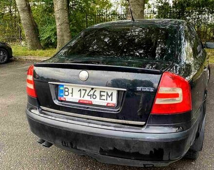 Чорний Шкода Октавія, об'ємом двигуна 2 л та пробігом 230 тис. км за 5600 $, фото 4 на Automoto.ua