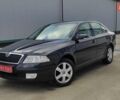 Черный Шкода Октавия, объемом двигателя 1.6 л и пробегом 218 тыс. км за 6999 $, фото 1 на Automoto.ua