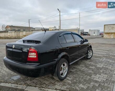 Черный Шкода Октавия, объемом двигателя 1.6 л и пробегом 370 тыс. км за 5300 $, фото 6 на Automoto.ua