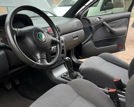 Черный Шкода Октавия, объемом двигателя 1.8 л и пробегом 265 тыс. км за 7000 $, фото 8 на Automoto.ua