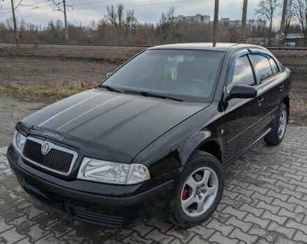 Черный Шкода Октавия, объемом двигателя 1.6 л и пробегом 370 тыс. км за 5300 $, фото 1 на Automoto.ua