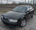 Черный Шкода Октавия, объемом двигателя 1.6 л и пробегом 370 тыс. км за 5300 $, фото 1 на Automoto.ua
