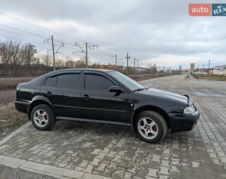 Черный Шкода Октавия, объемом двигателя 1.6 л и пробегом 370 тыс. км за 5300 $, фото 5 на Automoto.ua
