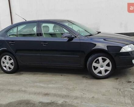 Черный Шкода Октавия, объемом двигателя 1.6 л и пробегом 218 тыс. км за 6999 $, фото 10 на Automoto.ua