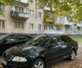 Черный Шкода Октавия, объемом двигателя 1.6 л и пробегом 245 тыс. км за 4900 $, фото 1 на Automoto.ua