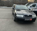 Черный Шкода Октавия, объемом двигателя 1.8 л и пробегом 256 тыс. км за 5500 $, фото 1 на Automoto.ua