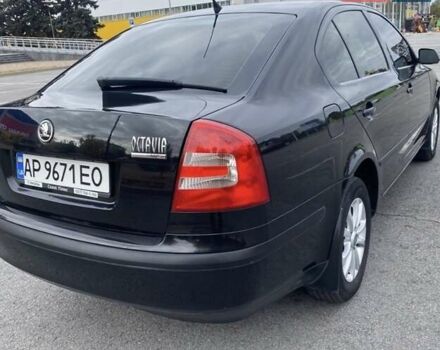 Черный Шкода Октавия, объемом двигателя 1.6 л и пробегом 210 тыс. км за 5600 $, фото 1 на Automoto.ua